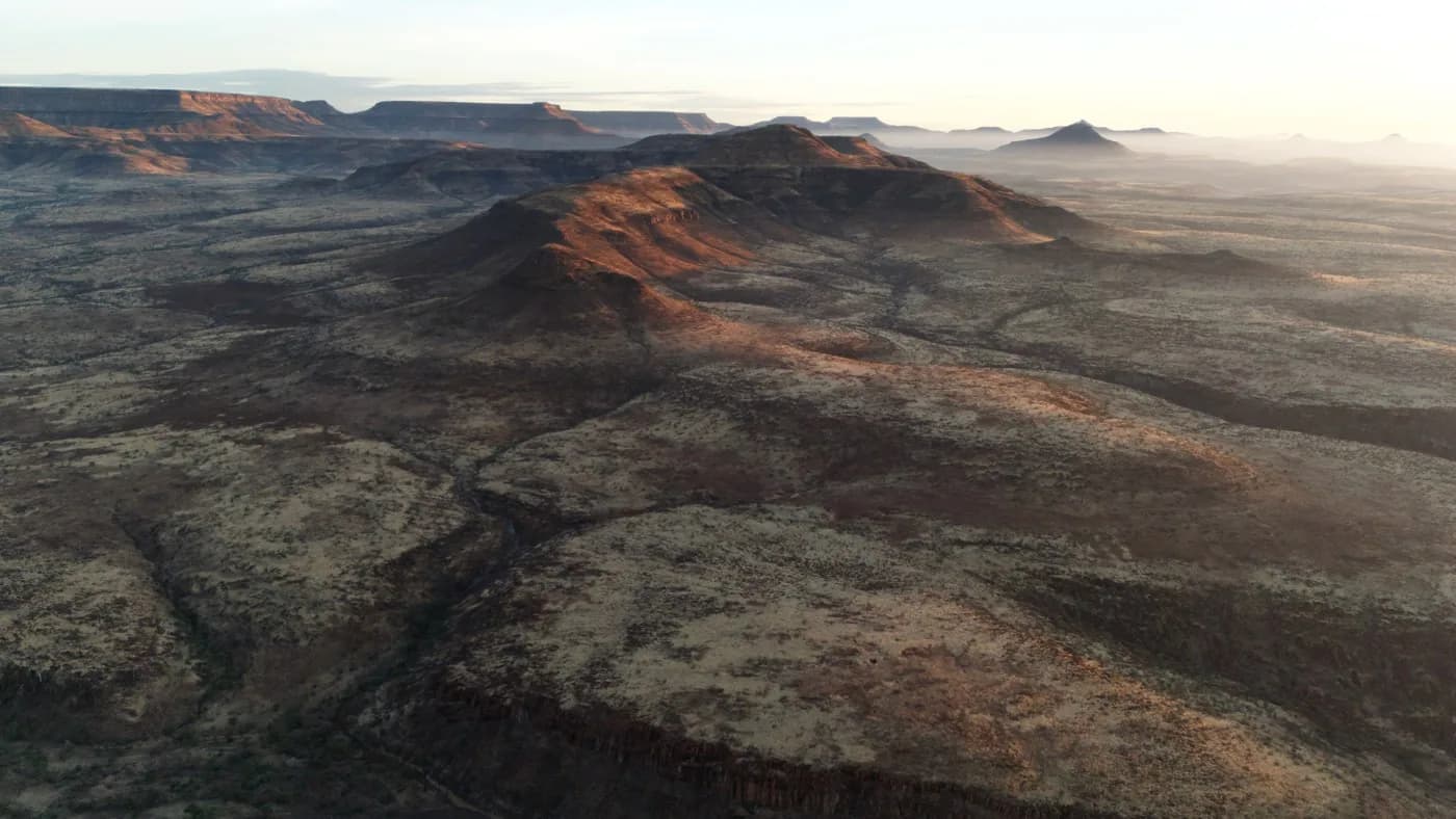 Broad Damaraland mesas and valleys; regional landscape scenery, not property photography